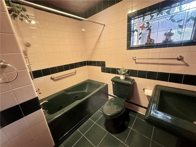 bathroom featuring tile walls, tile patterned floors, toilet, and  shower combination