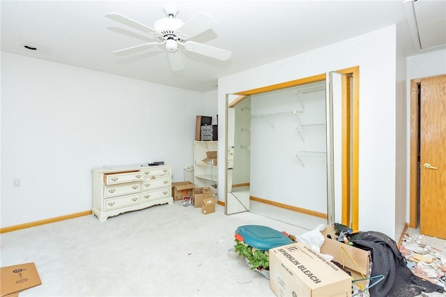 bedroom featuring ceiling fan and a closet