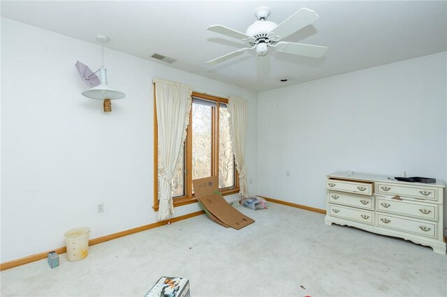 interior space featuring ceiling fan