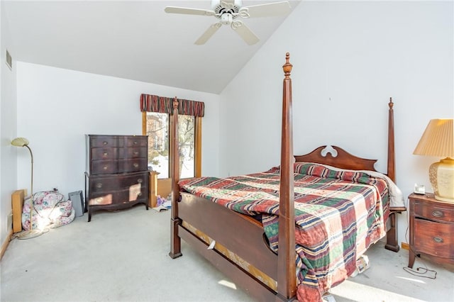 bedroom featuring ceiling fan, lofted ceiling, and carpet flooring