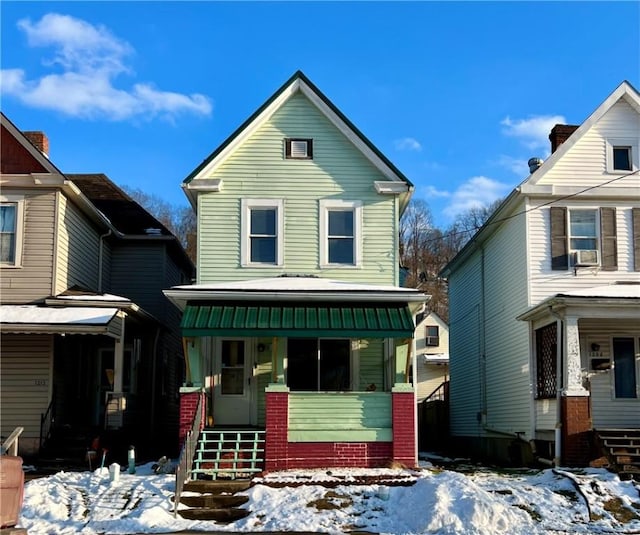 front of property featuring a porch