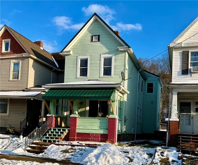 front facade with a porch