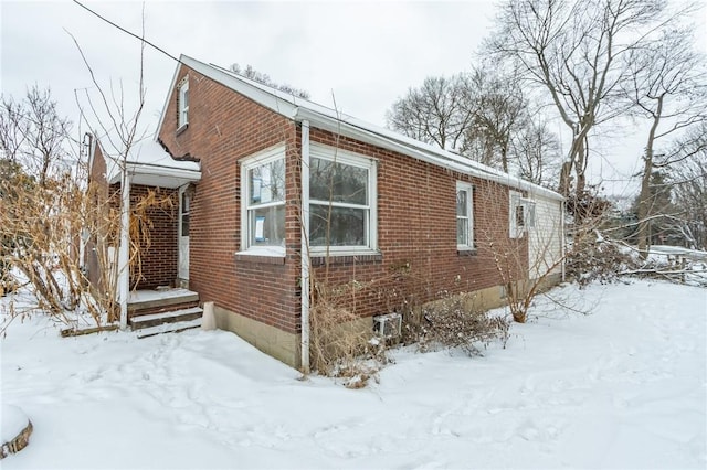 view of snow covered property