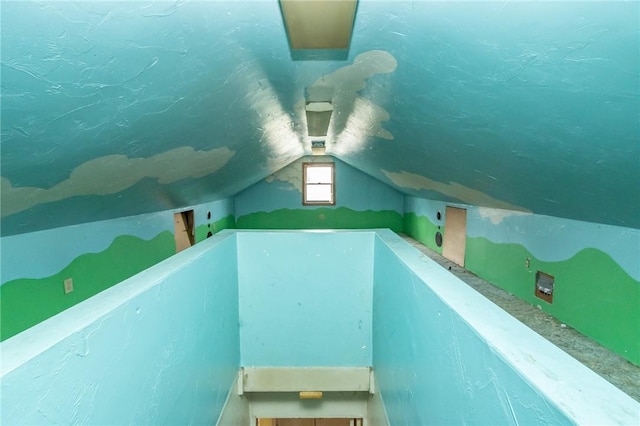 bonus room featuring lofted ceiling
