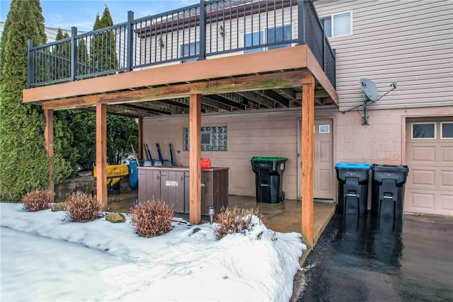 view of snow covered patio