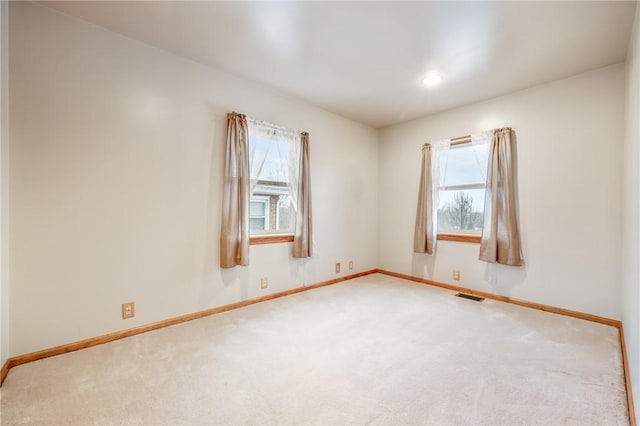 view of carpeted spare room