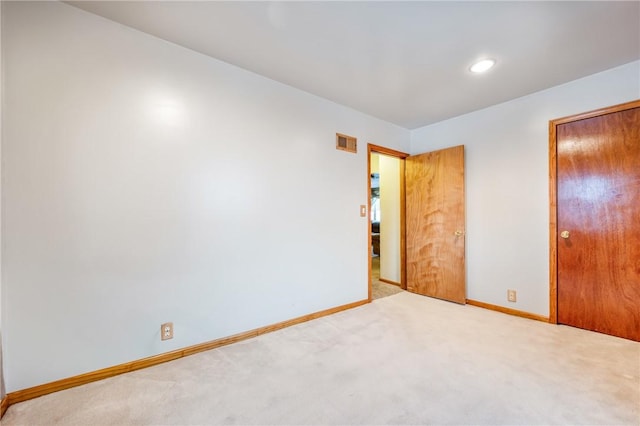 unfurnished bedroom with a closet and carpet flooring