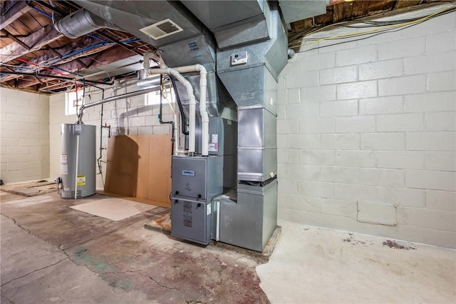 utility room with heating unit and water heater