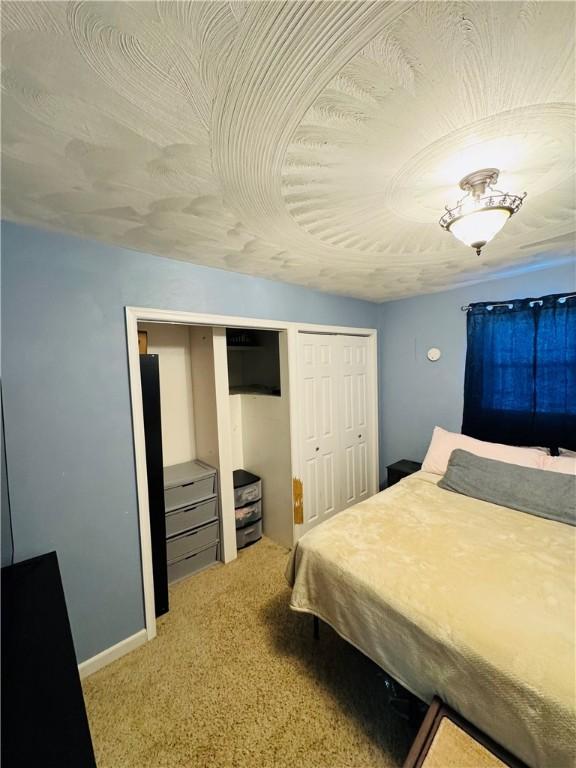 bedroom featuring carpet floors