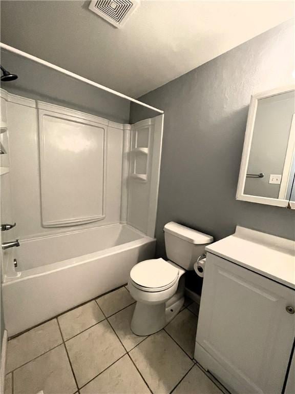 full bathroom with tub / shower combination, tile patterned floors, vanity, and toilet