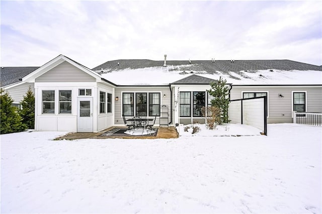 view of snow covered property