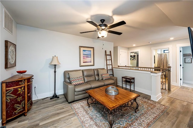 living room with light hardwood / wood-style floors