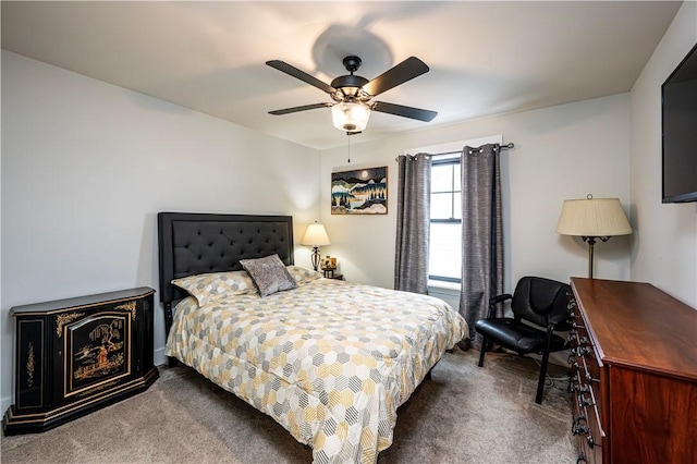 bedroom with dark carpet and ceiling fan