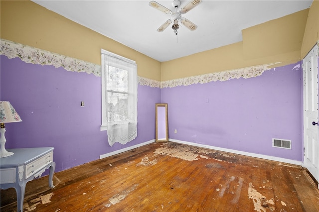 unfurnished bedroom featuring ceiling fan and wood-type flooring