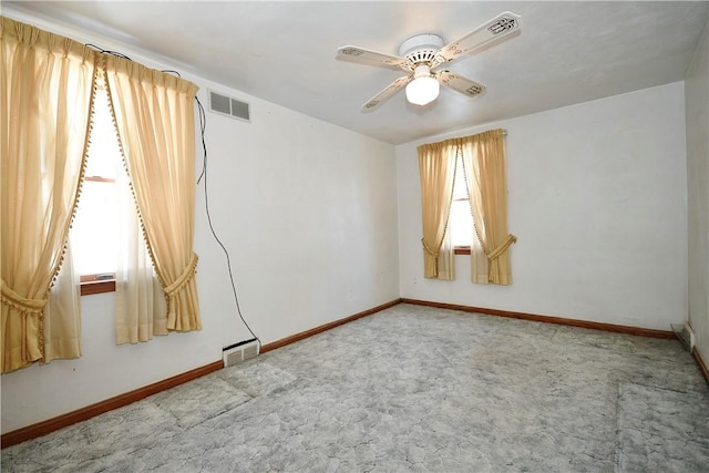 empty room featuring ceiling fan and carpet floors