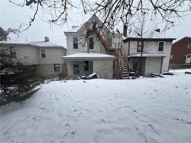 view of snow covered property