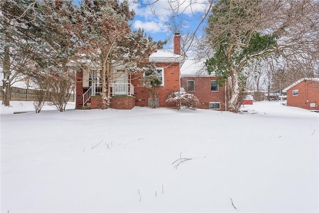 view of yard covered in snow