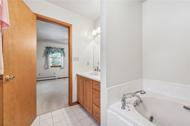 bathroom featuring tiled bath, baseboard heating, tile patterned floors, and vanity