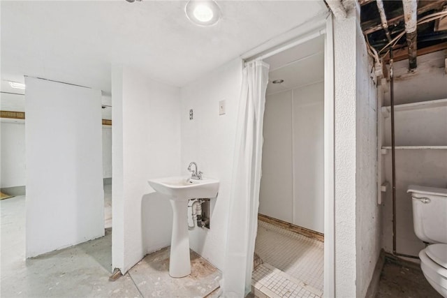 bathroom featuring toilet