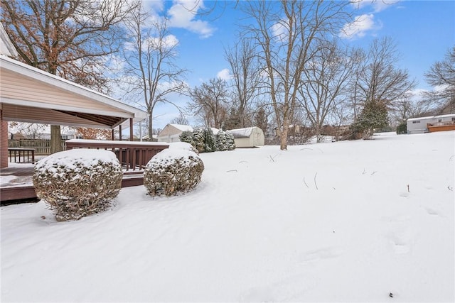 view of yard covered in snow