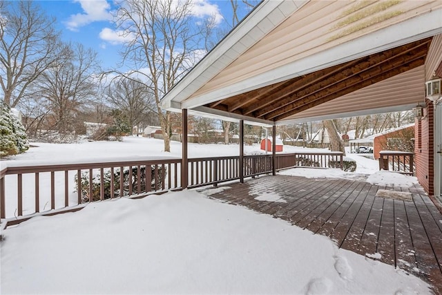 view of snow covered deck