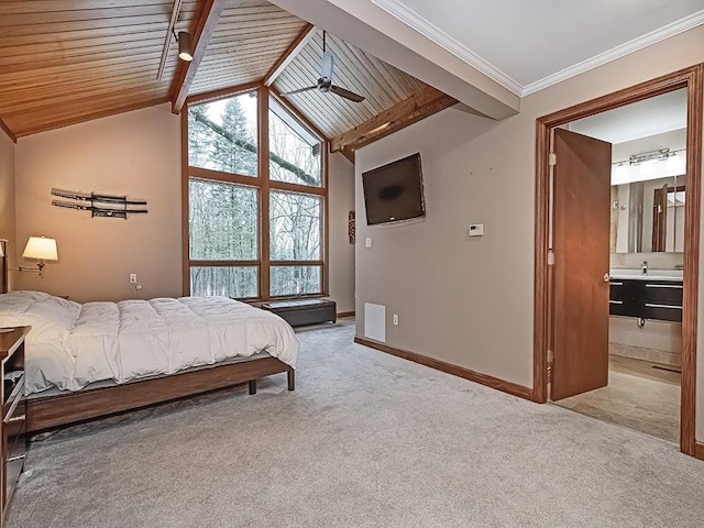 carpeted bedroom featuring wood ceiling, connected bathroom, and lofted ceiling with beams