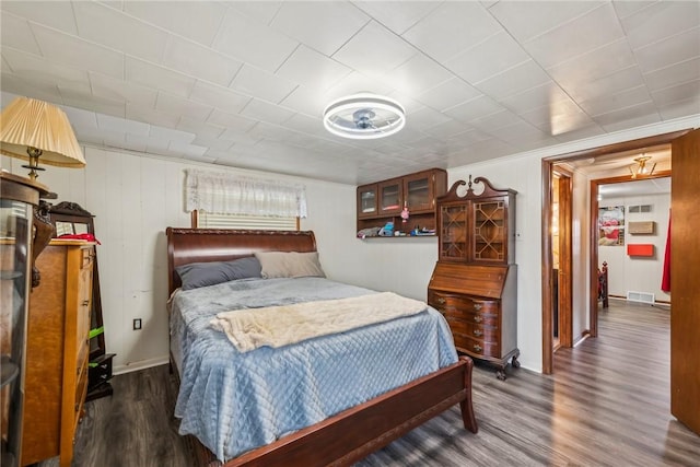 bedroom featuring dark wood-type flooring