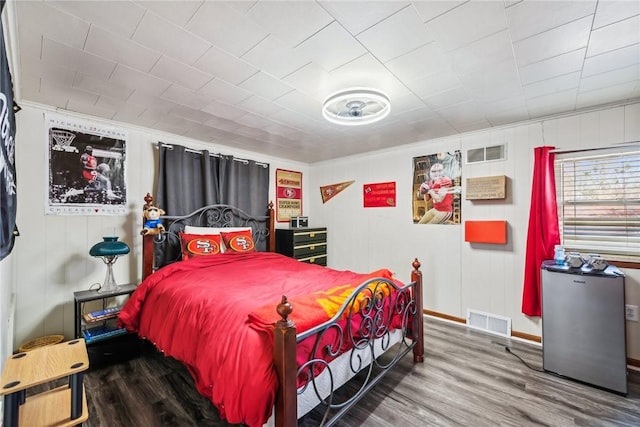 bedroom featuring hardwood / wood-style floors