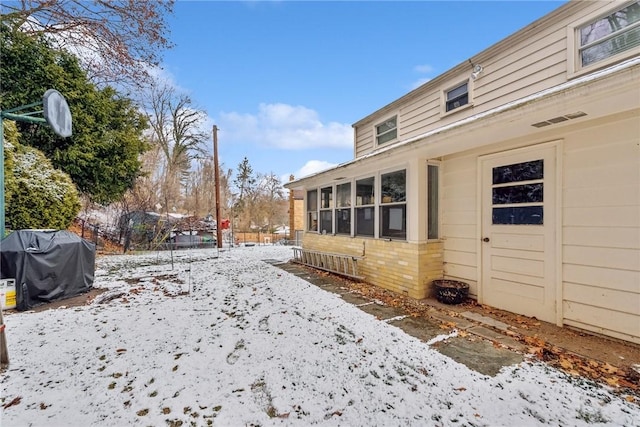 view of yard covered in snow