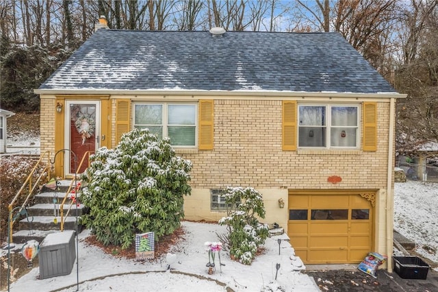 view of front of home with a garage