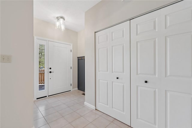 entrance foyer featuring light tile patterned flooring