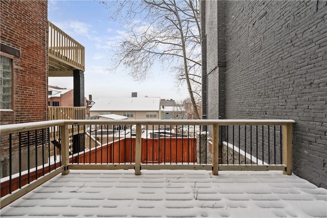 view of snow covered deck