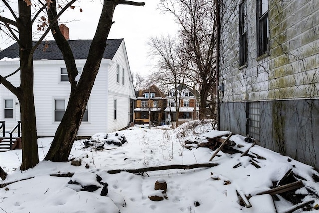 view of yard covered in snow