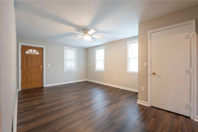 foyer entrance featuring ceiling fan and dark hardwood / wood-style flooring