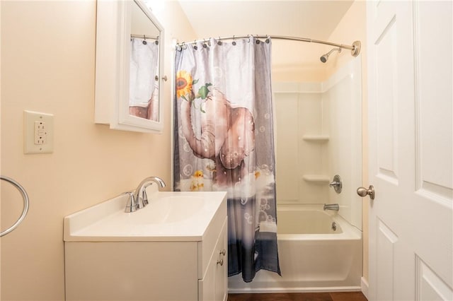 bathroom featuring vanity and shower / bath combo with shower curtain