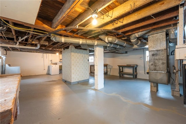 basement featuring separate washer and dryer