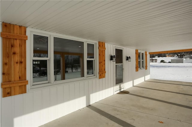 view of snow covered patio