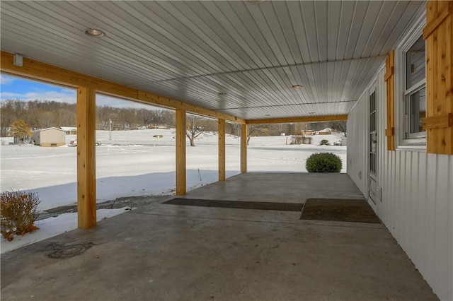 view of snow covered patio