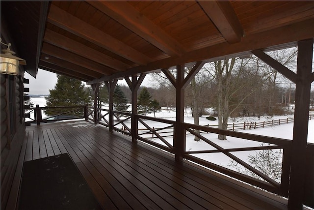 view of snow covered deck