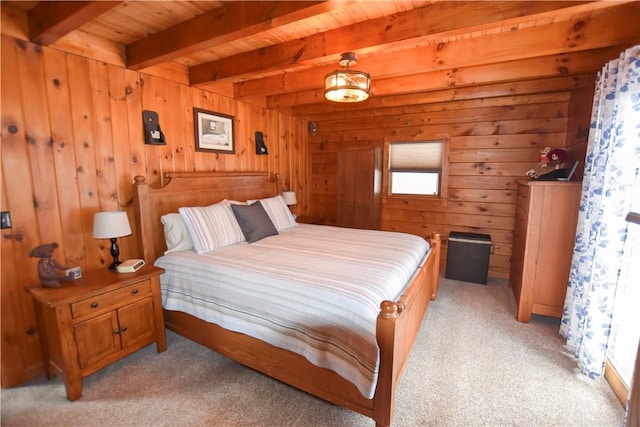 carpeted bedroom featuring wood ceiling, beamed ceiling, and wooden walls