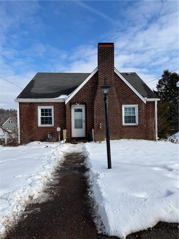 view of snow covered house