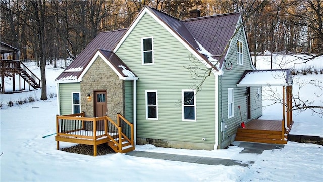 view of snow covered property