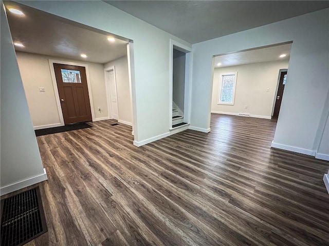 entrance foyer featuring dark hardwood / wood-style flooring