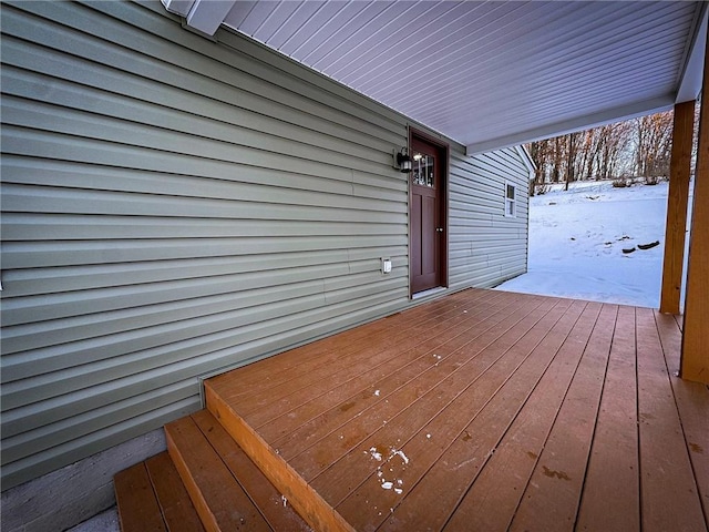 view of snow covered deck