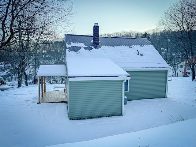 view of snow covered property