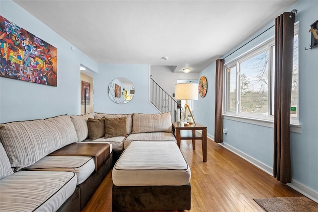 living room with light hardwood / wood-style floors