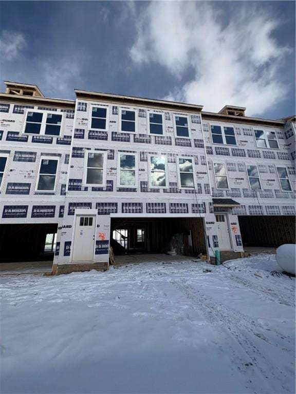 view of snow covered building