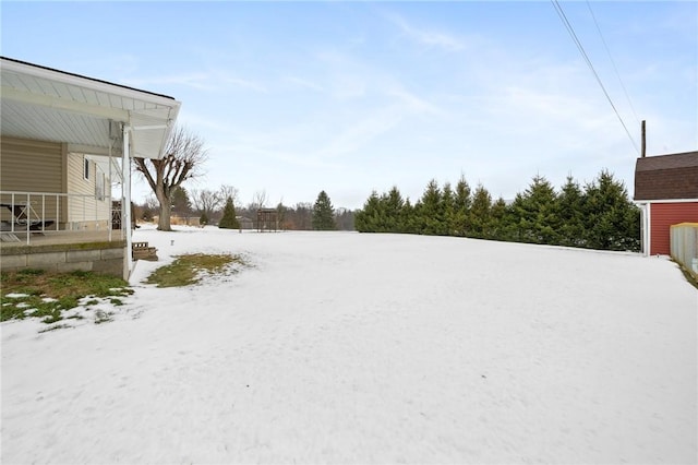 view of snowy yard