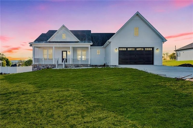 491 Shannon Dr, Mount Pleasant Twp Wml, PA 15666 - modern farmhouse style home with a porch, driveway, a front lawn, and a garage