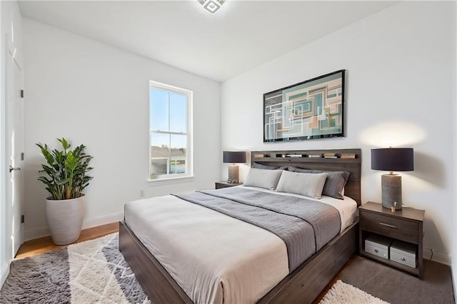 bedroom featuring hardwood / wood-style flooring